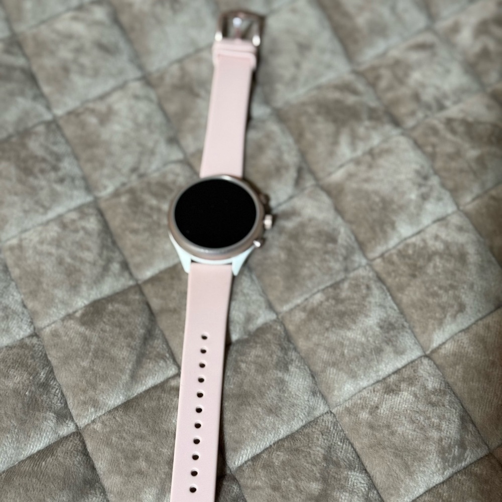Fossil Pink Watch with Circular Display and Silver Casing